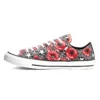 Chuck Taylor All Star Low “Allover Mix Logo Play”